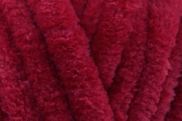 Vibrant scarlet red chenille toddler blanket, hand-knitted for a bold, cosy touch—perfect for christmas gifts or toddler room accents.