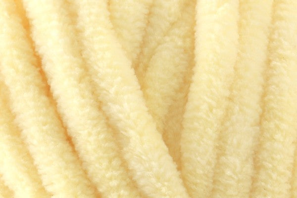 Sunny yellow baby blanket, hand-knitted in plush chenille and decorated with cute crocheted strawberries—perfect for cheerful nurseries or gender-neutral baby gifts.