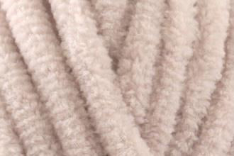 Oatmeal-coloured chenille toddler blanket, hand-knitted with a warm neutral tone—ideal for cosy naps or neutral minimalist toddler rooms.