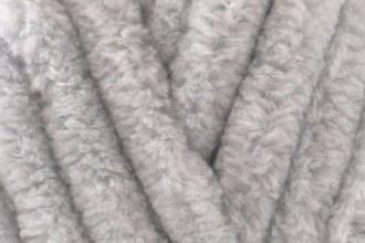 Elegant silver chenille toddler blanket, hand-knitted with plush texture—perfect for toddler beds or calm, modern nurseries.