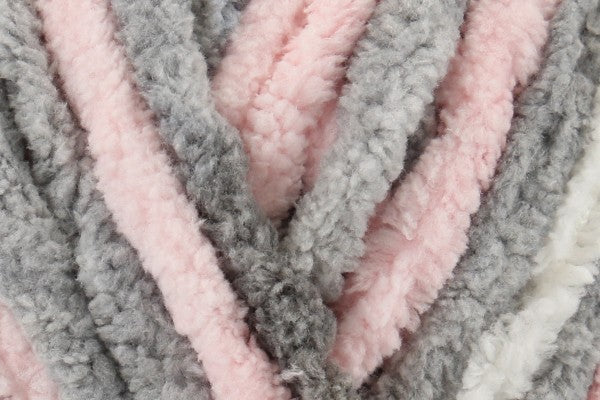 Close-up of ultra-soft chenille yarn in muted blush, grey and rose tones – Dusky Rose Snuggle Square baby comforter by SnugaBug